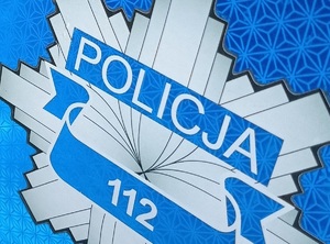 symbol policji na niebieskim tle